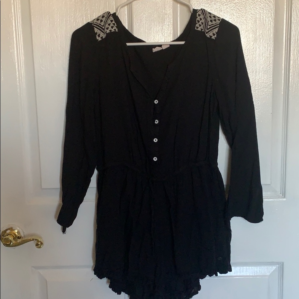 Foxy black romper with white detailing
